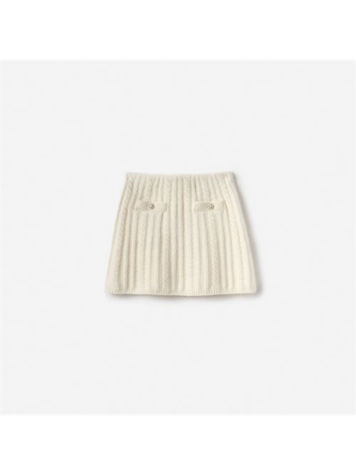 Gonna in Lana Merino e Alpaca Particolarmente comoda e scintillante, questa gonna in maglia di alpaca color crema è impreziosita da bottoni scintillanti sulle tasche funzionali. Abbinala a Cardigan in coordinato disponibile.Fedele alle dimensioniIl tessuto è elasticoCintura elasticaTasche funzionaliDecorazione con bottoni finti SELF PORTRAIT | AW25-710SK-CCREAM